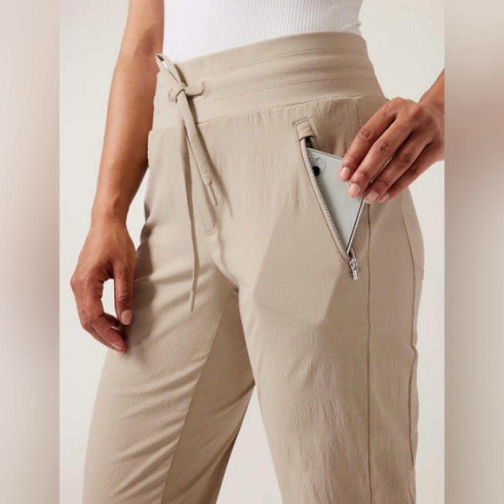 ATHLETA Trekkie North Jogger NWT -
Size 14 Women's Tan Pants with Zipper Pocket